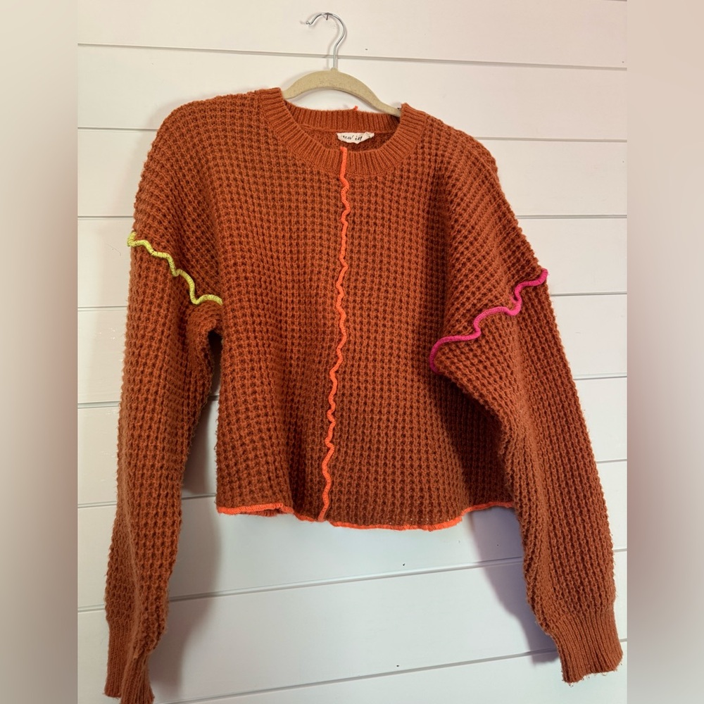 Vibrant Orange Sweater with Neon Details